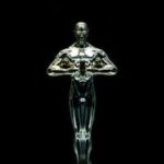 A golden trophy statue isolated on a black background symbolizing achievement and victory.